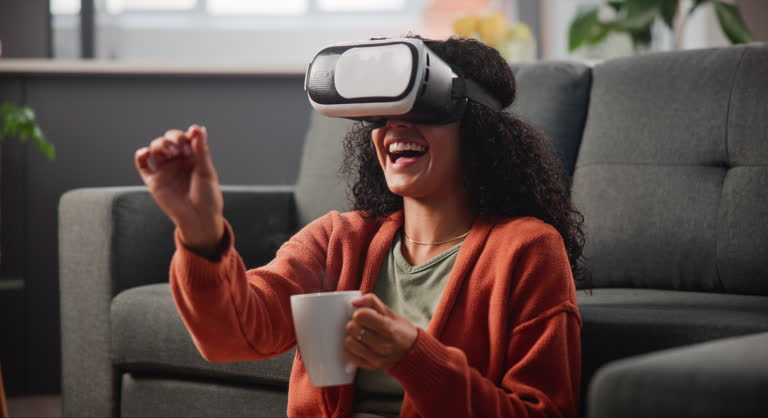 Woman, streaming and VR technology with smile for metaverse, comedy show and digital transformation. Home, female person and laughing for augmented reality with movie, connection and user experience