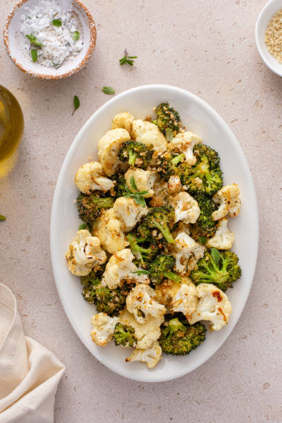istock Roasted cauliflower and broccoli on a serving plate, healthy vegetable side dish 2149879729