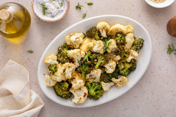 istock Roasted cauliflower and broccoli on a serving plate, healthy vegetable side dish 2149879735