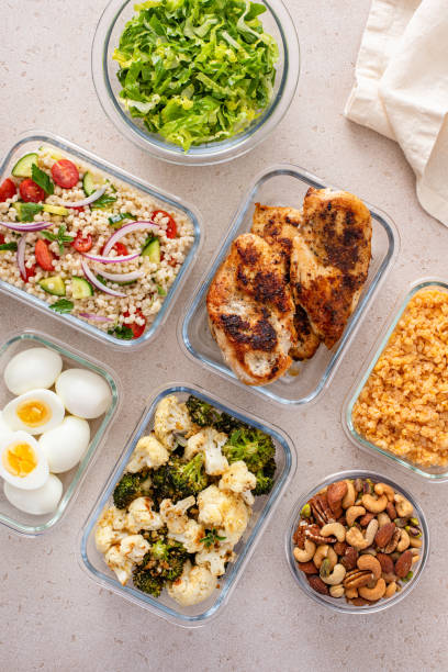 istock Healthy meal prep with cooked chicken breast, boiled eggs, roasted vegetables, cooked lentils, couscous salad and nuts 2149879758