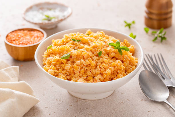 istock Cooked red lentils in a bowl, healthy vegan protein source 2149879770