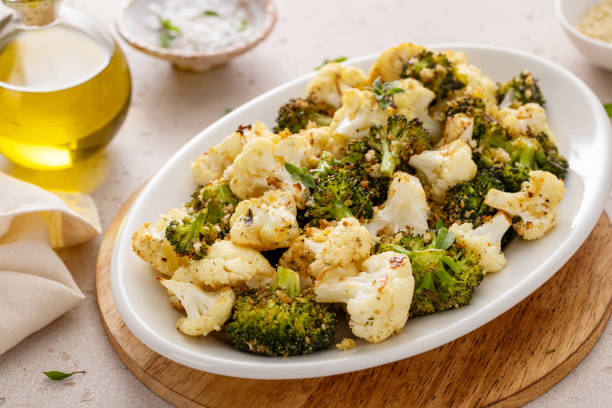 istock Roasted cauliflower and broccoli on a serving plate, healthy vegetable side dish 2149879801