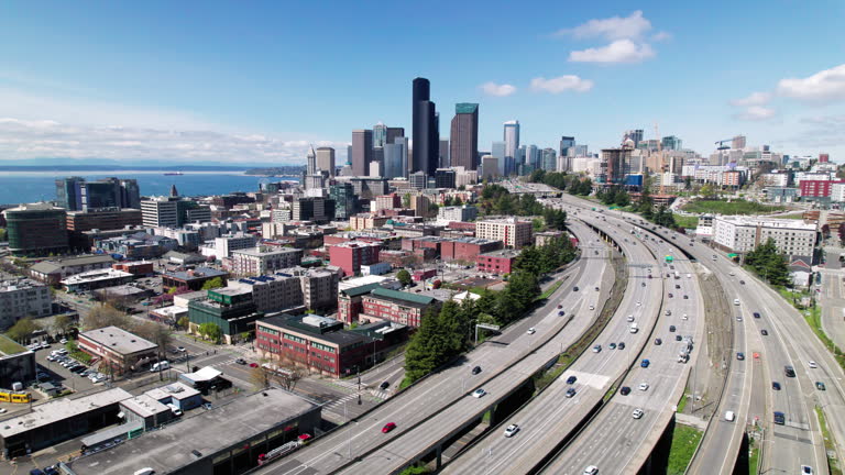 People on Freeway Work Commute with Seattle Skyline