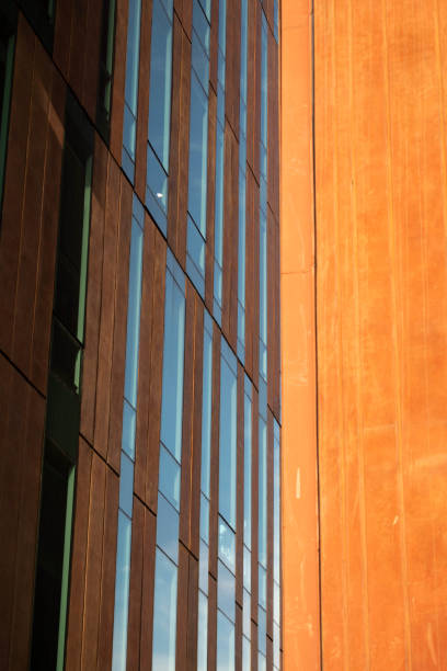 istock Harmonious Blend of Modernity in Brown and Orange Architectural Facades. Architecture background 2149882545
