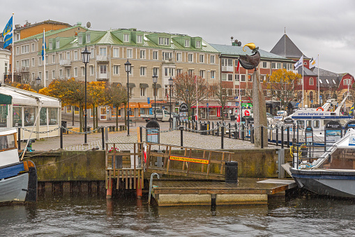 Stromstad, Sweden - November 1, 2016: Small Town Water Front Pier Dock at Autumn Day.