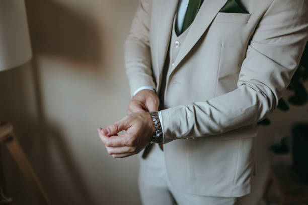 istock Guy is getting dressed for a business meeting. 2149883869