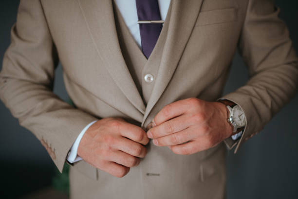 istock Guy is getting dressed for a business meeting. 2149884042