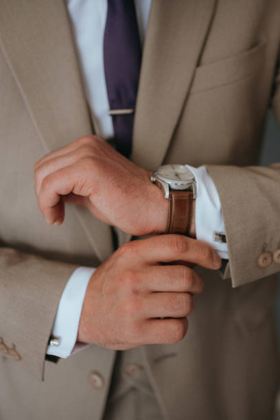istock Guy is getting dressed for a business meeting. 2149884046