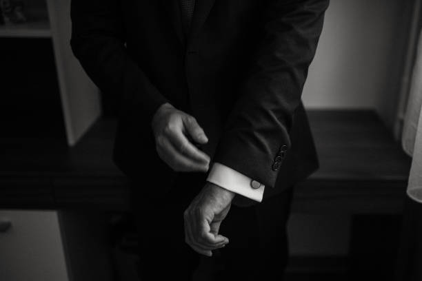 istock Guy is getting dressed for a business meeting. 2149884061