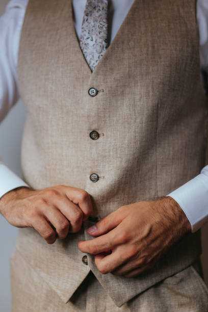 istock Guy is getting dressed for a business meeting. 2149884097