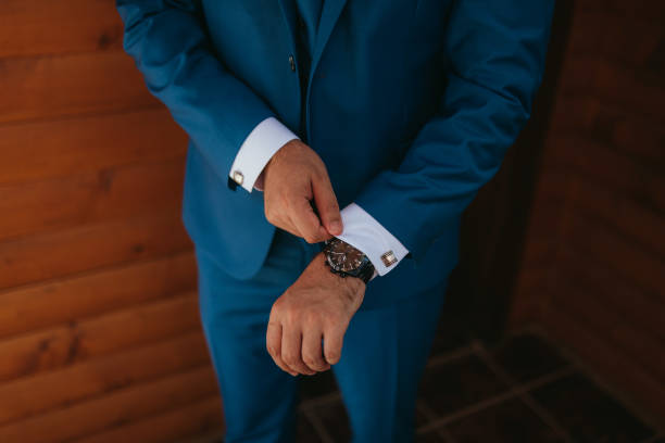 istock Guy is getting dressed for a business meeting. 2149884183