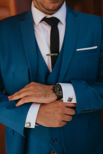 istock Guy is getting dressed for a business meeting. 2149884191