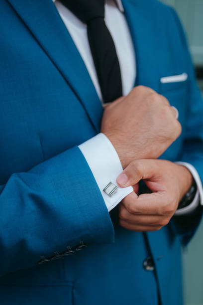 istock Guy is getting dressed for a business meeting. 2149884196