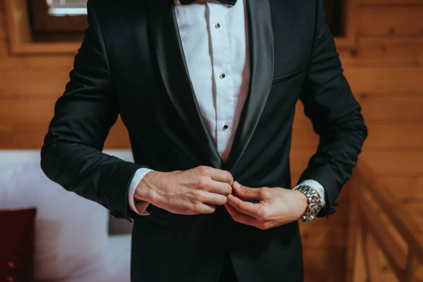 istock Guy is getting dressed for a business meeting. 2149884354