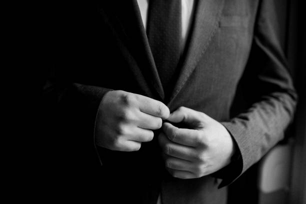 istock Guy is getting dressed for a business meeting. 2149884359