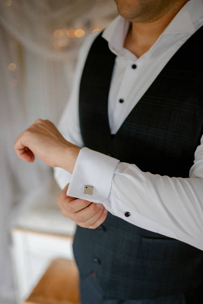 istock Guy is getting dressed for a business meeting. 2149884361
