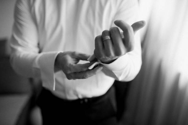 istock Guy is getting dressed for a business meeting. 2149885058