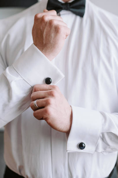 istock Guy is getting dressed for a business meeting. 2149885062