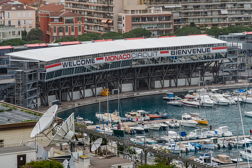 Monaco, Monaco. March 29, 2024. Marina and building with grandstands mounted along the city with the letters welcome to monaco, for the formula 1 race.
