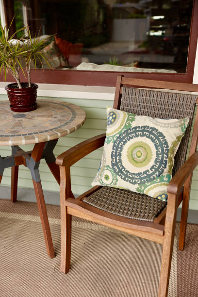 istock Teakwood table and chairs on the front porch 2149887341