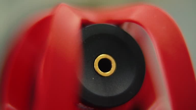 Macro shot of a shotgun microphone, PL input, red mic back side, camera gear, sound record equipment, slow motion 120 fps, Full HD, tilt up smooth movement