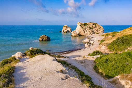 Cyprus. Aphrodite Bay. Aphrodite's rock, the view from the shore of the beach. Petra Tou Romiou. Pathos. Kuklia. The beaches in Cyprus. Mediterranean sea. Sea cliff. Coast Of The Republic Of Cyprus.