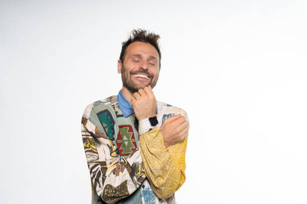 Radiant Smile: Young Guy in Relaxed Vibrant Shirt