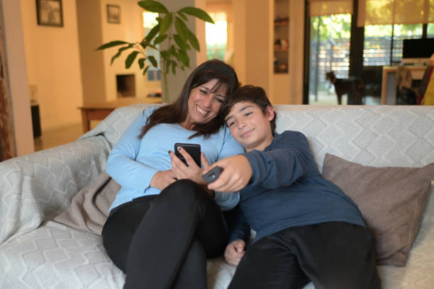 istock woman and child enjoying technology 2149896005