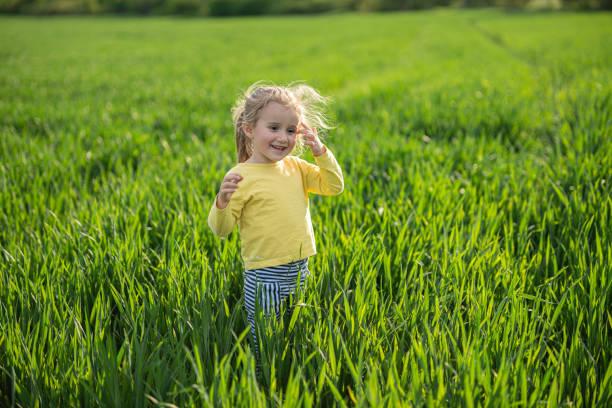 istock Happy Child Portrait in Wheat Field at Sunset, copy space. 2149896680
