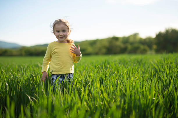 istock Happy Child Portrait in Wheat Field at Sunset, copy space. 2149896684
