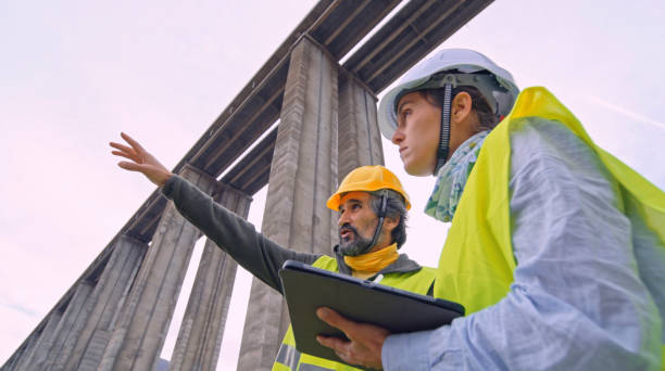 istock Road engineers working. Building new highways. 2149898203