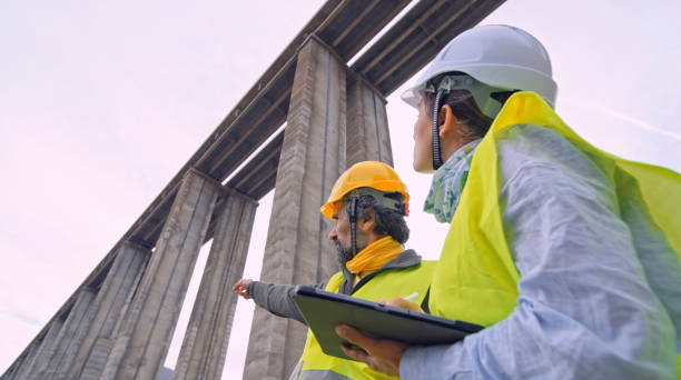 istock Road engineers working. Building new highways. 2149898205