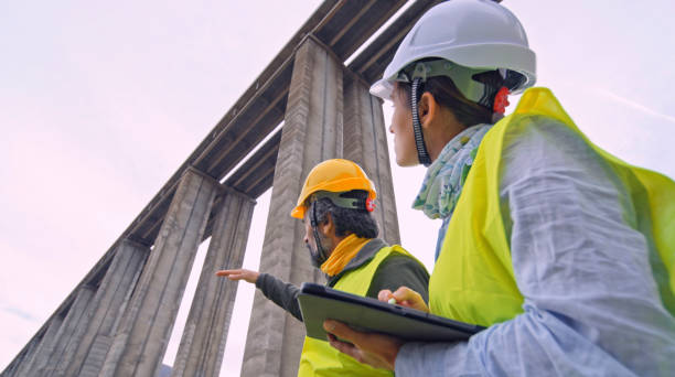 istock Road engineers working. Building new highways. 2149898206