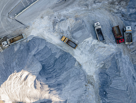 Drone's flight over a construction site landscape. Transportation industry.
