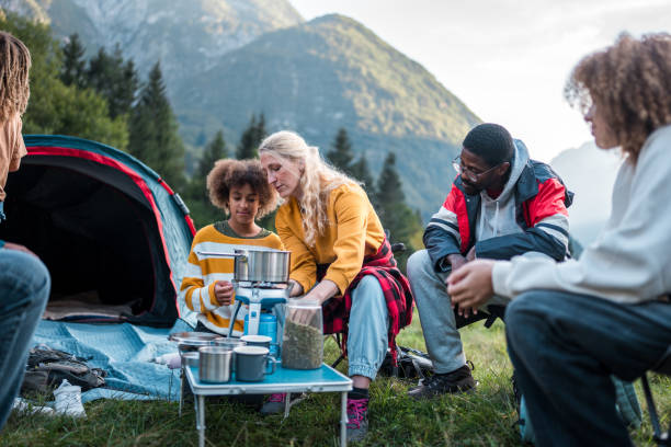istock Diverse Family Engages in Outdoor Cooking While Camping 2149898570