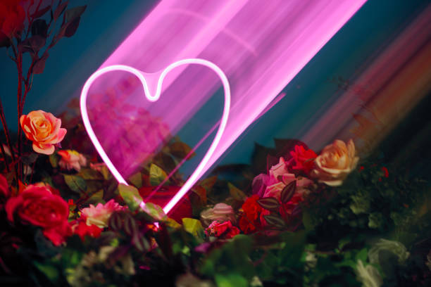 istock Neon Heart in a Floral Background Symbolizing Love and Affection 2149900676