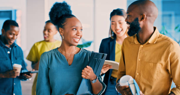 istock Happy, documents and employees for discussion in office, working or job for creative career. People, teamwork and collaboration for conversation in media, design company or diversity in workspace 2149903943