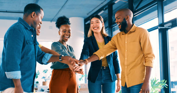 istock Teamwork, employees and hands for happy support, group and staff collaboration for motivation with businesspeople. Team building, career and goals in office, partnership or cooperation in workplace 2149903970