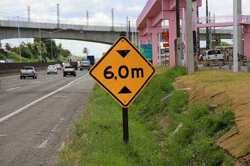salvador, bahia, brazil - march 19, 2024: traffic salvador, bahia, brazil - march 19, 2024: traffic signs indicate a height limit of 6 meters for vehicles traveling on the Federal highway BR 324.