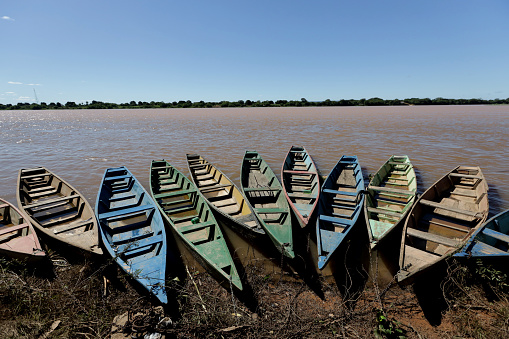 carinhanha, bahia, brazil - april 13, 2024: Fisherman's canoes are seen stuck on the banks of the Sao Francisco River in the city of Carinhanha.