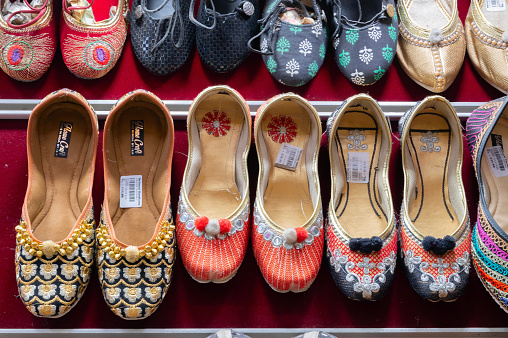 Pairs of Rajasthani ladies' shoes at display for sale. Jodhpur, Rajasthan, India.