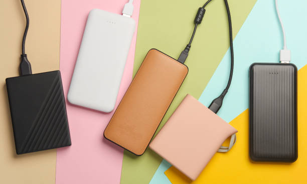 istock Different power banks external batteries on a colored pastel background 2149914958