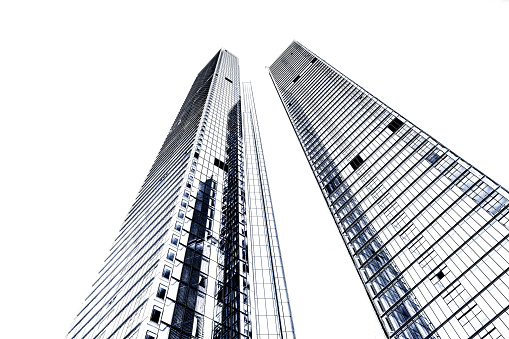 Black and white low angle view of modern office buildings, background with copy space, full frame horizontal composition
