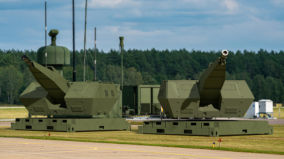 Automated radar-guided artillery positions for the protection of military bases.3d illustration