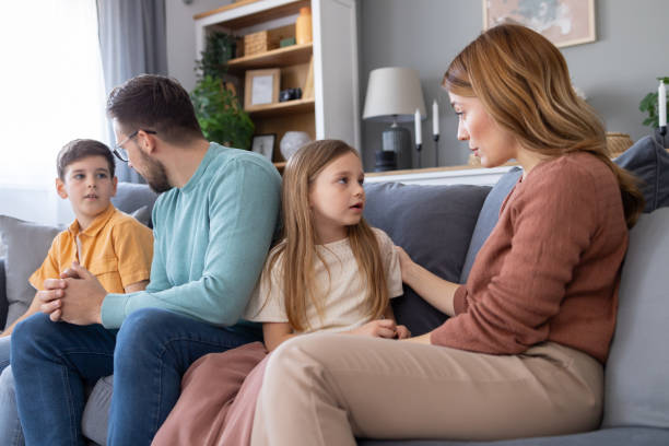 istock Family in a serious conversation at home 2149923560