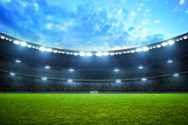 istock Empty nobody soccer stadium field with blue sky, soccer background 2149925075
