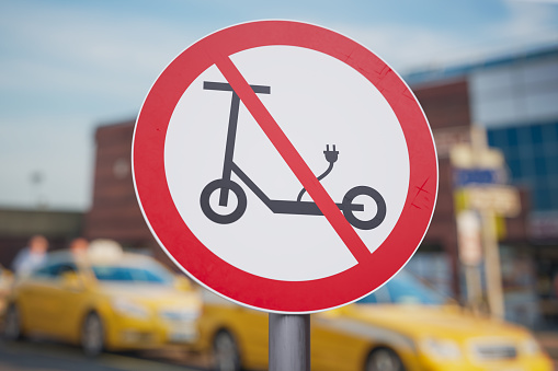 Forbidden electric scooter road sign. 3D rendered illustration.