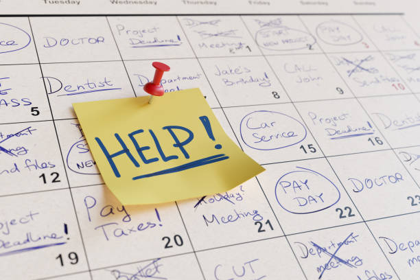 istock Very busy calendar with many notes and sticky note with help. 3D rendered illustration. 2149928167