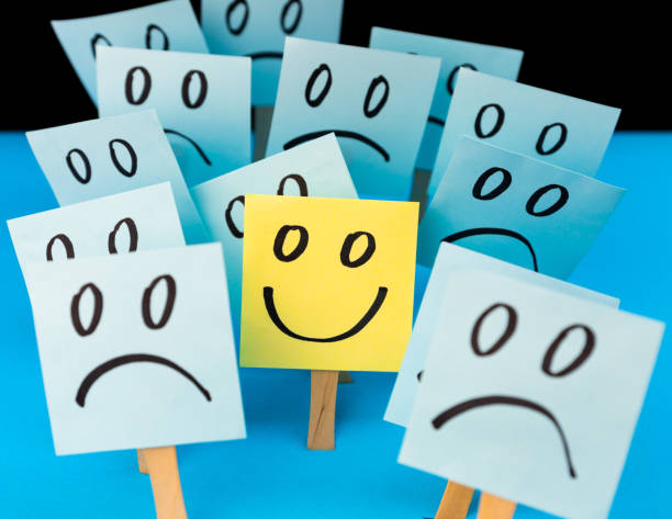 istock Sticky notes with hand drawn Smiley face and Sad faces. Positive way of thinking concept. Positive overcomes negative 2149931063