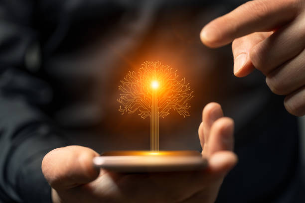 istock Artificial intelligence new life tree symbol on smartphone in hand 2149932137